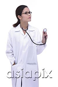AsiaPix - Female doctor in lab coat, holding stethoscope, looking away