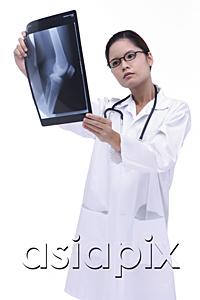 AsiaPix - Doctor looking at  X-ray