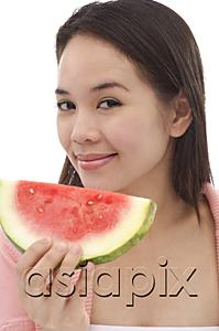 AsiaPix - Young woman with slice of watermelon