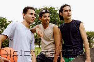 PictureIndia - Three young men, looking away