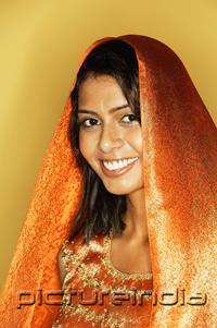PictureIndia - Woman in Indian clothing, smiling, head shot