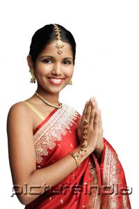 PictureIndia - Woman in traditional Indian costume, smiling at camera