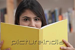 PictureIndia - Woman with yellow book