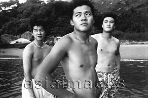 Asia Images Group - Three teenagers at beach