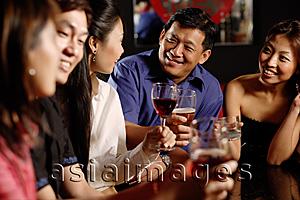 Asia Images Group - Friends having drinks at bar