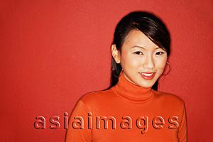 Asia Images Group - Young woman smiling at camera, portrait