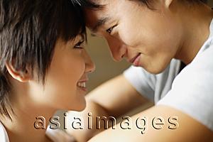 Asia Images Group - Couple face to face, foreheads touching