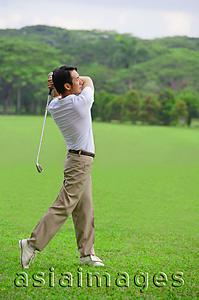 Asia Images Group - Golfer playing golf