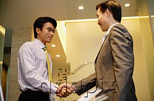 AsiaPix - Businessmen shaking hands