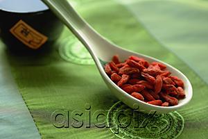 AsiaPix - Dried fruit in ceramic spoon, still life