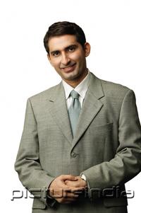 PictureIndia - Businessman, looking at camera, portrait